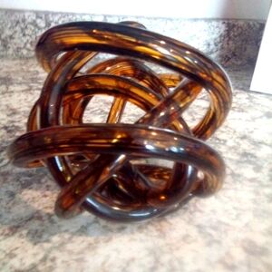 Brown glass love knot